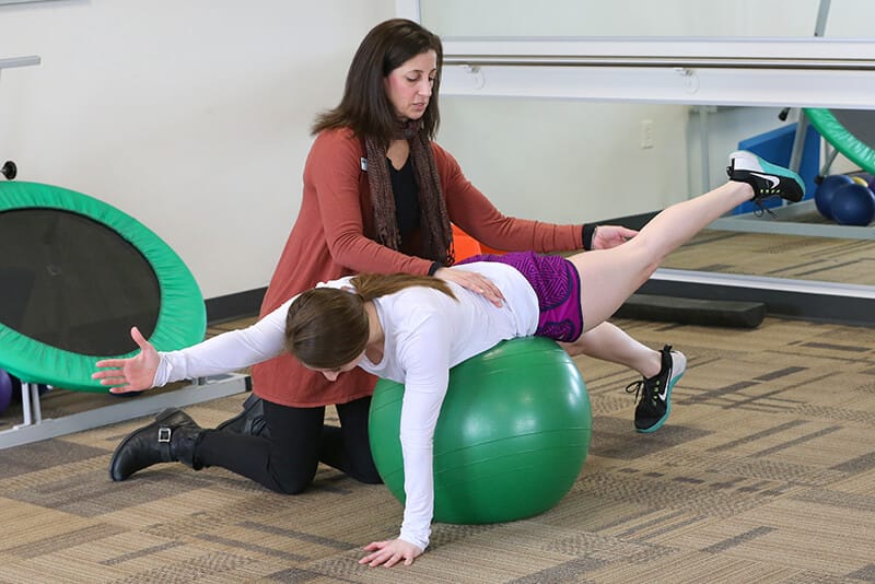 Physical therapists and patient at The Iowa Clinic